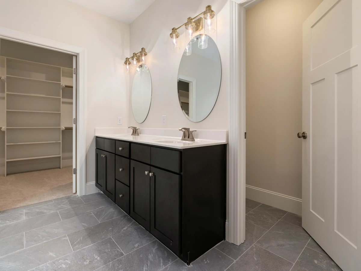 Modern dark bathroom freshly painted by Richmond Decorators in Richmond upon Thames