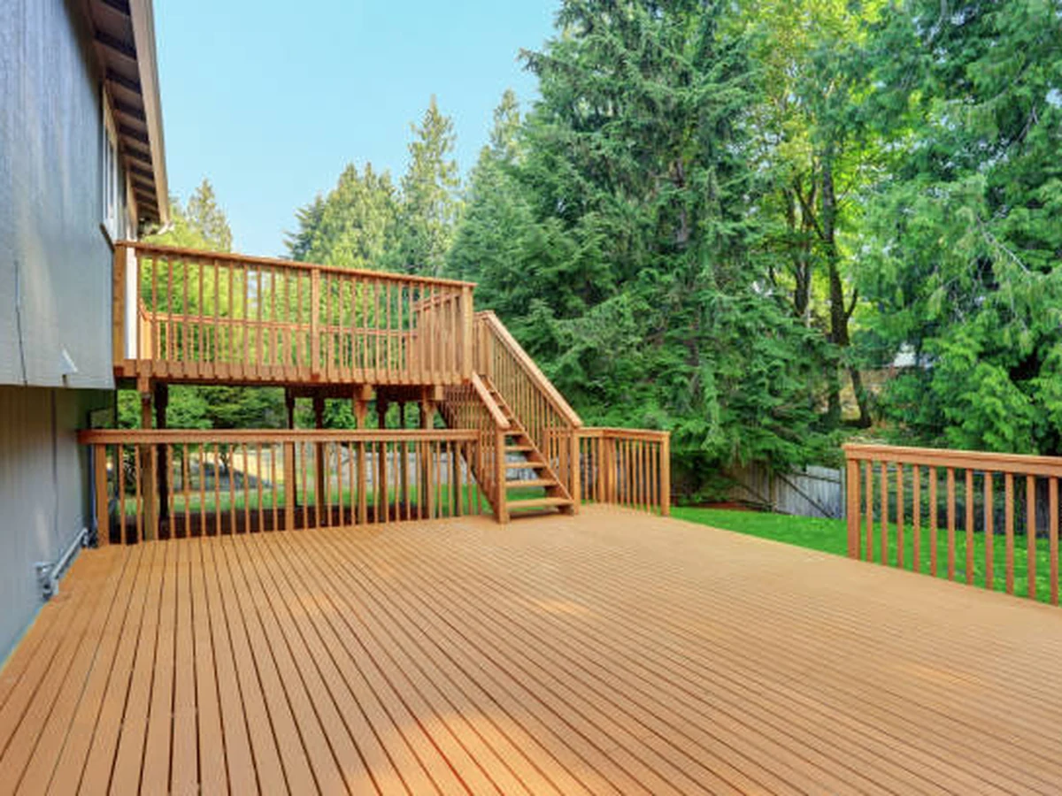 Deck painting on a large elevated wooden deck in Richmond by Richmond Decorators