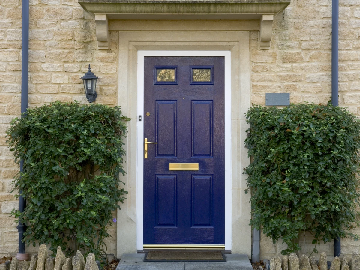 Heritage navy blue front door painting on a Barnes Victorian villa by Richmond Decorators