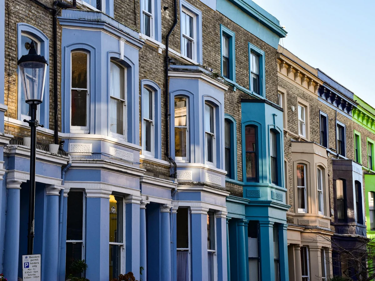 Exterior painting in Richmond - colourful Victorian terraced houses by Richmond Decorators