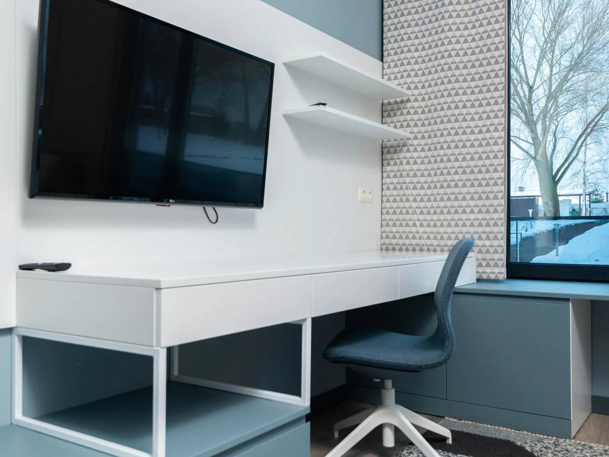 Modern home office with freshly painted walls and desk area by Richmond Decorators