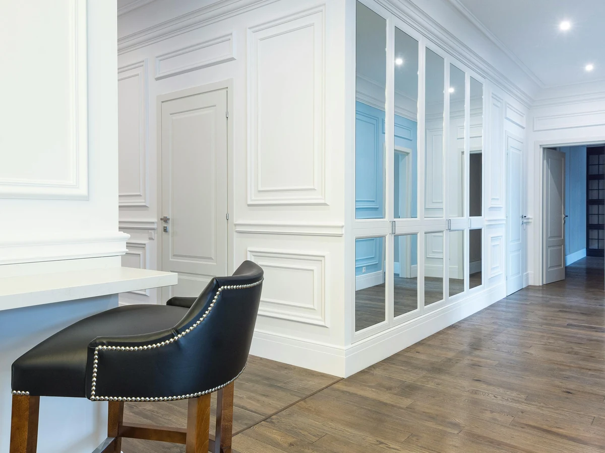 Interior painting services in Richmond - elegant white panelled room by Richmond Decorators