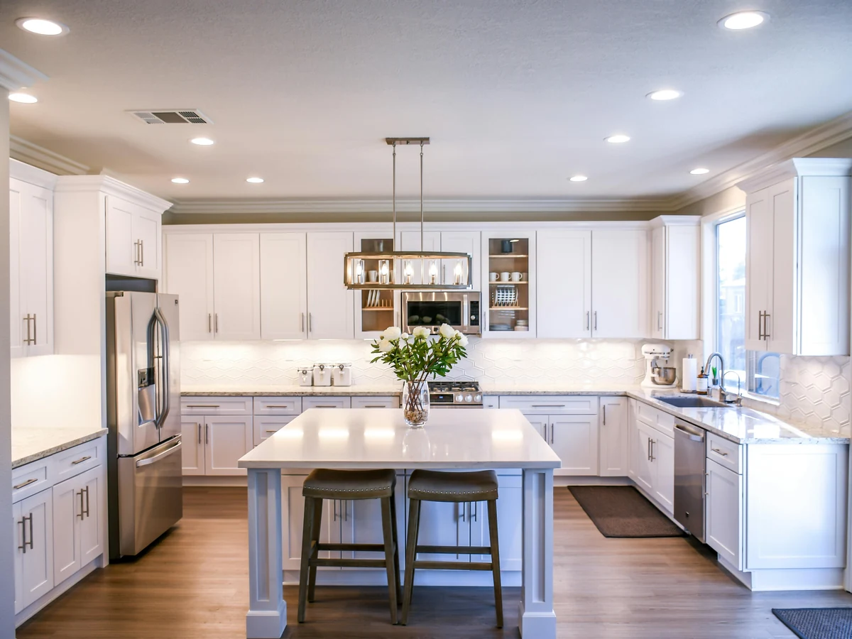 kitchen-painting-bright-white-kitchen-richmond-decorators Bright white kitchen with a central island and pendant lights