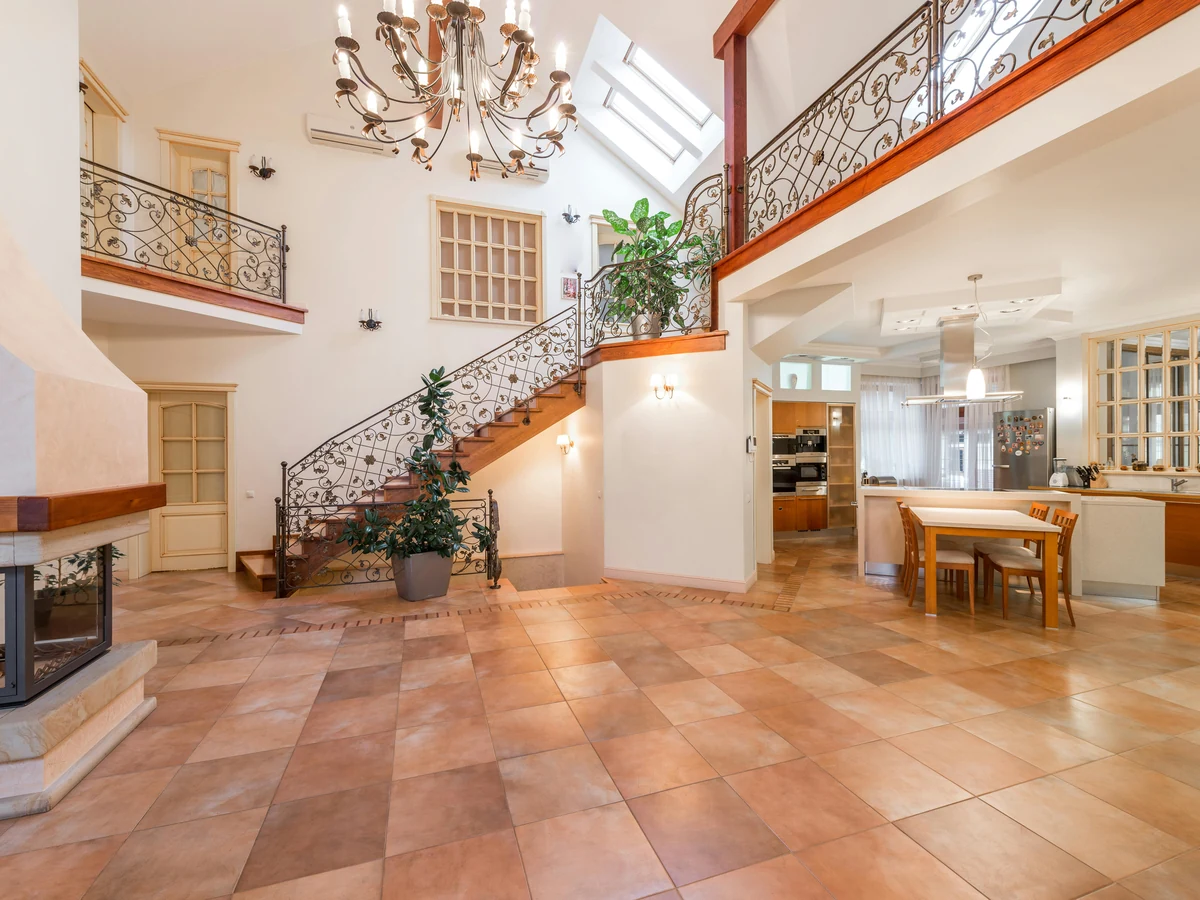 Grand interior hallway staircase painting by Richmond Decorators in Kingston upon Thames